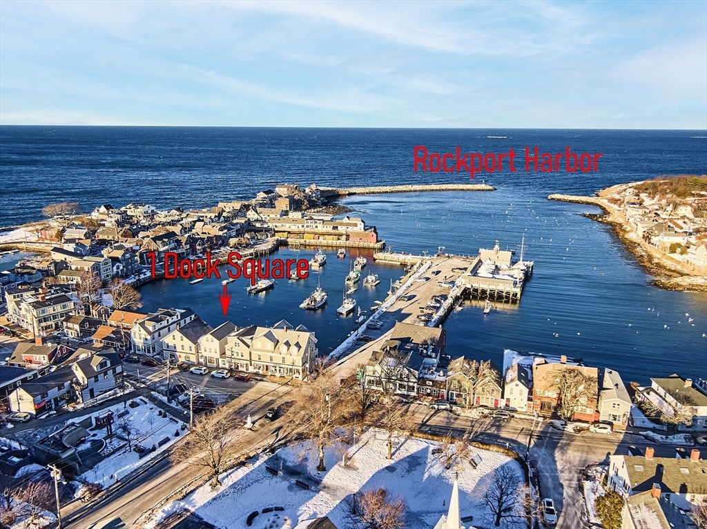 1 Dock Square Rockport, MA 01966 - Photo 4 of 34 a view of water heater and a table with chair