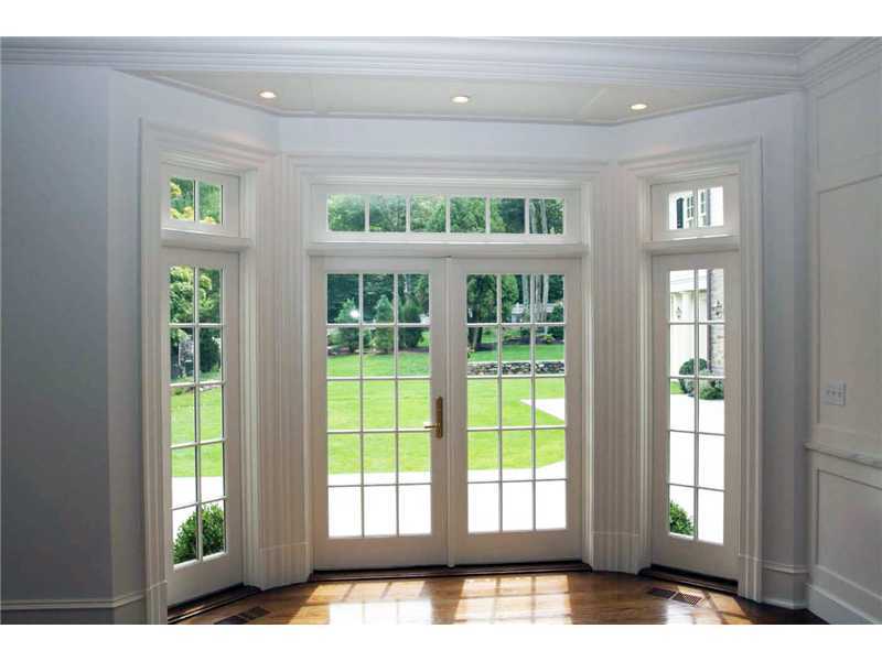 717 Riversville Road Greenwich, CT 06831 - Photo 17 of 24 a view of an entryway with a floor to ceiling window