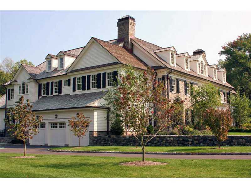 717 Riversville Road Greenwich, CT 06831 - Photo 23 of 24 a front view of a house with a yard