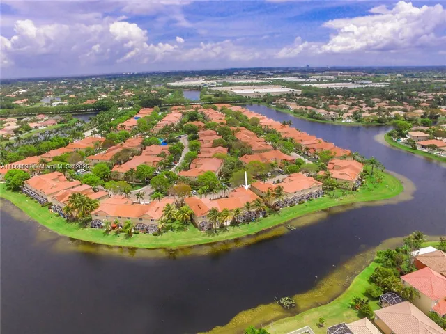 a view of a lake with a swimming pool