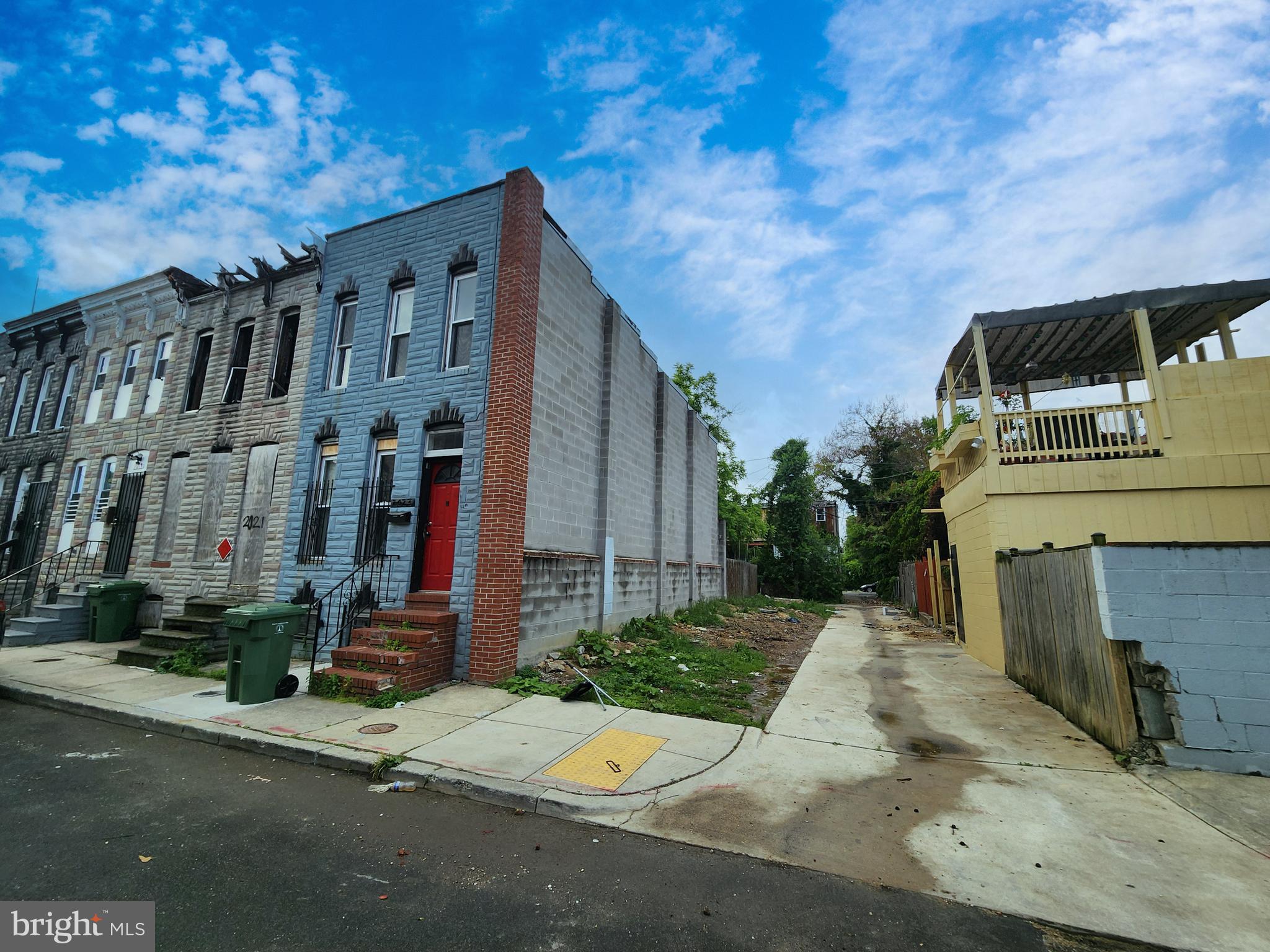 2023 Wilhelm Street Baltimore, MD 21223 - Photo 3 of 5 a front view of a house with a yard
