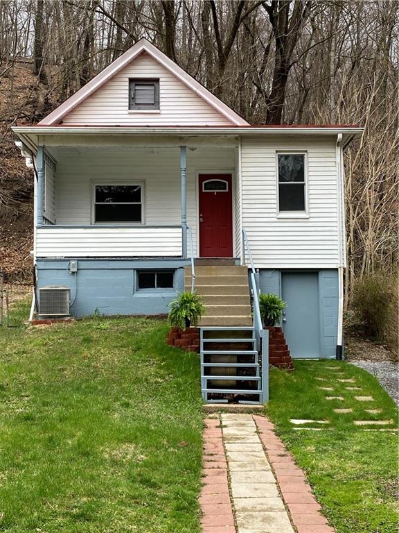 a front view of house with yard