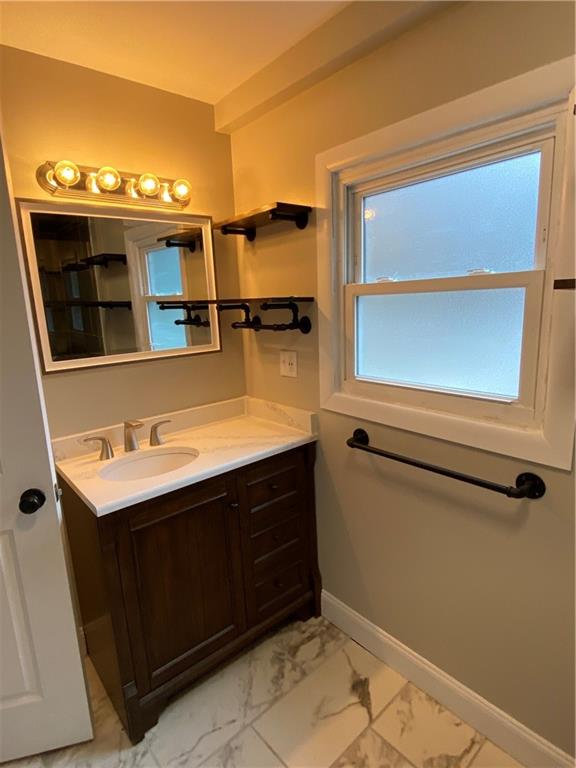 238 Hickory Street McKees Rocks, PA 15136 - Photo 12 of 18 a bathroom with a sink and a mirror