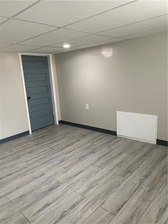 238 Hickory Street McKees Rocks, PA 15136 - Photo 15 of 18 a view of an empty room with wooden floor