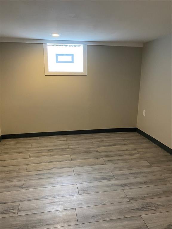 238 Hickory Street McKees Rocks, PA 15136 - Photo 16 of 18 a view of an empty room and window