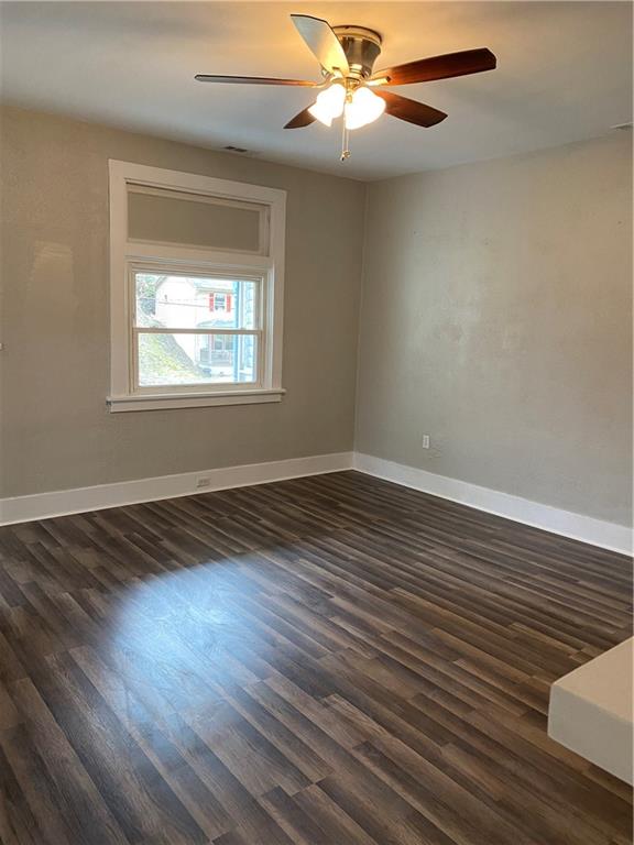 238 Hickory Street McKees Rocks, PA 15136 - Photo 3 of 18 a view of an empty room with wooden floor and a window