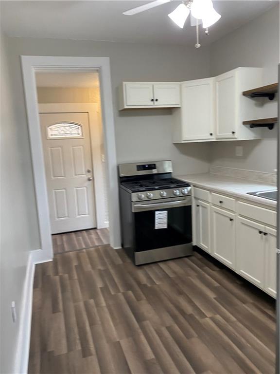 238 Hickory Street McKees Rocks, PA 15136 - Photo 8 of 18 a kitchen with a stove and white cabinets