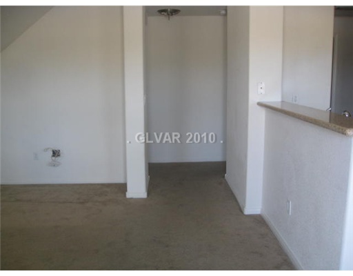 7701 West Robindale Road, Unit 105 Las Vegas, NV 89113 - Photo 2 of 3 Living Room.
