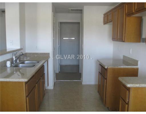 7701 West Robindale Road, Unit 105 Las Vegas, NV 89113 - Photo 3 of 3 Kitchen.