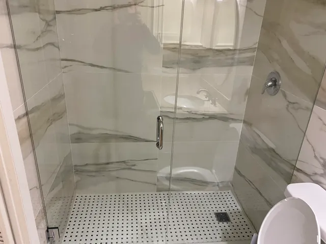 a bathroom with a toilet and a sink