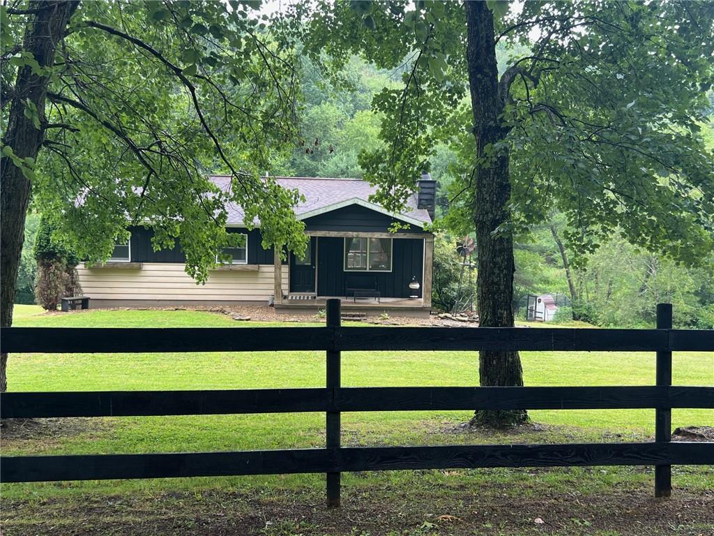 495 State Rte 1035 Kittanning, PA 16201 - Photo 4 of 50 a front view of a house with a yard