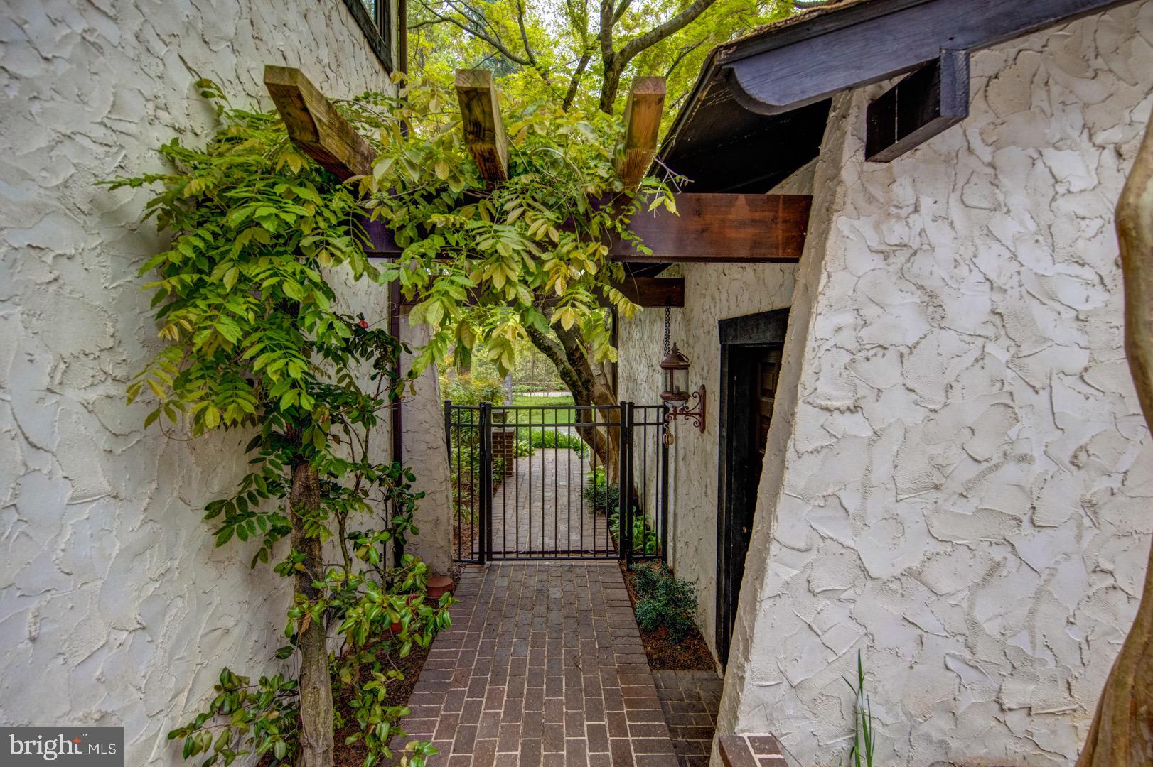 9 Fenimore Lane Wayne, PA 19087 - Photo 3 of 32 Walkway between detached garage and home