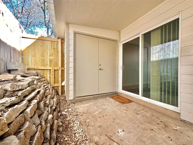 a view of a backyard of a house