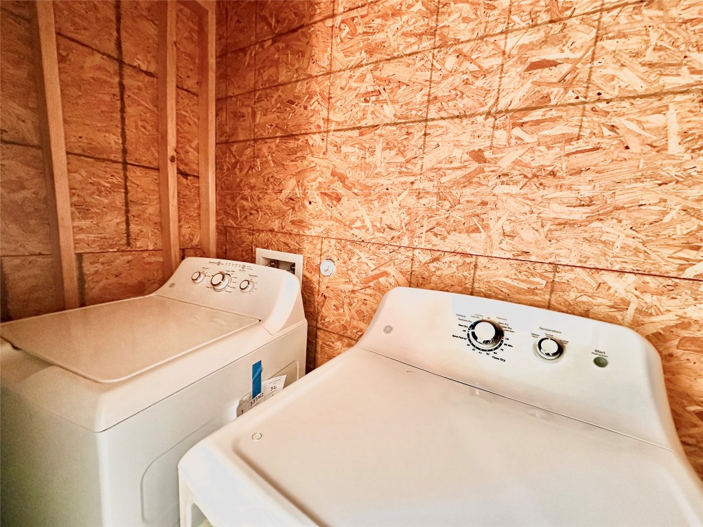 1200 Banister Lane, Unit 2 Austin, TX 78704 - Photo 3 of 14 a utility room with dryer and washer