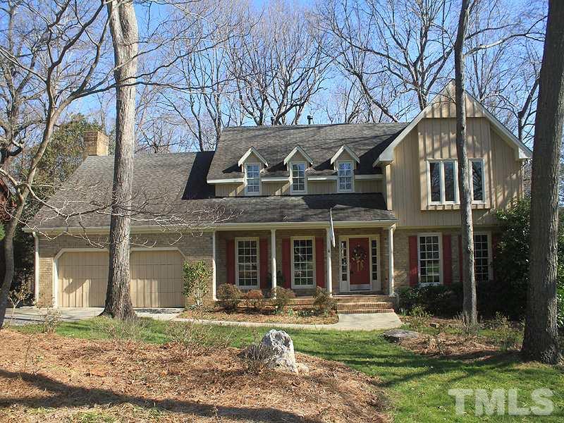 5016 Trail Ridge Drive Raleigh, NC 27613 - Photo 1 of 25 a front view of a house with yard and green space