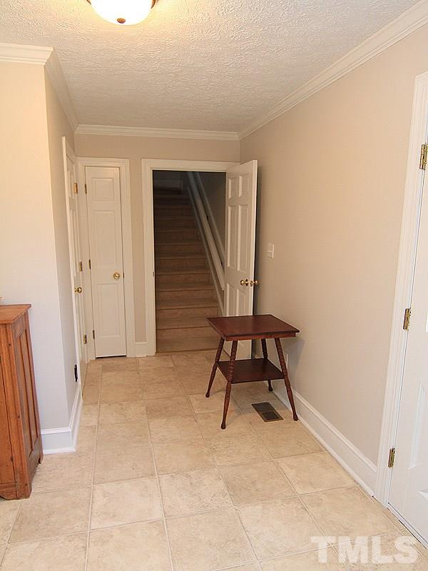 5016 Trail Ridge Drive Raleigh, NC 27613 - Photo 13 of 25 a view of an empty room