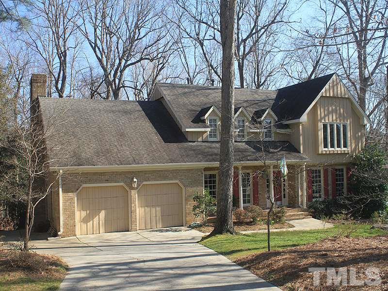 5016 Trail Ridge Drive Raleigh, NC 27613 - Photo 3 of 25 a front view of a house with a yard