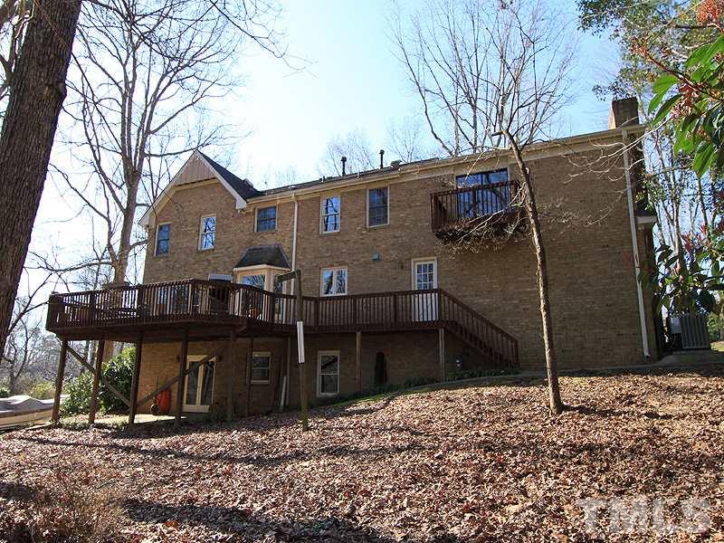 5016 Trail Ridge Drive Raleigh, NC 27613 - Photo 24 of 25 a view of a house with a yard