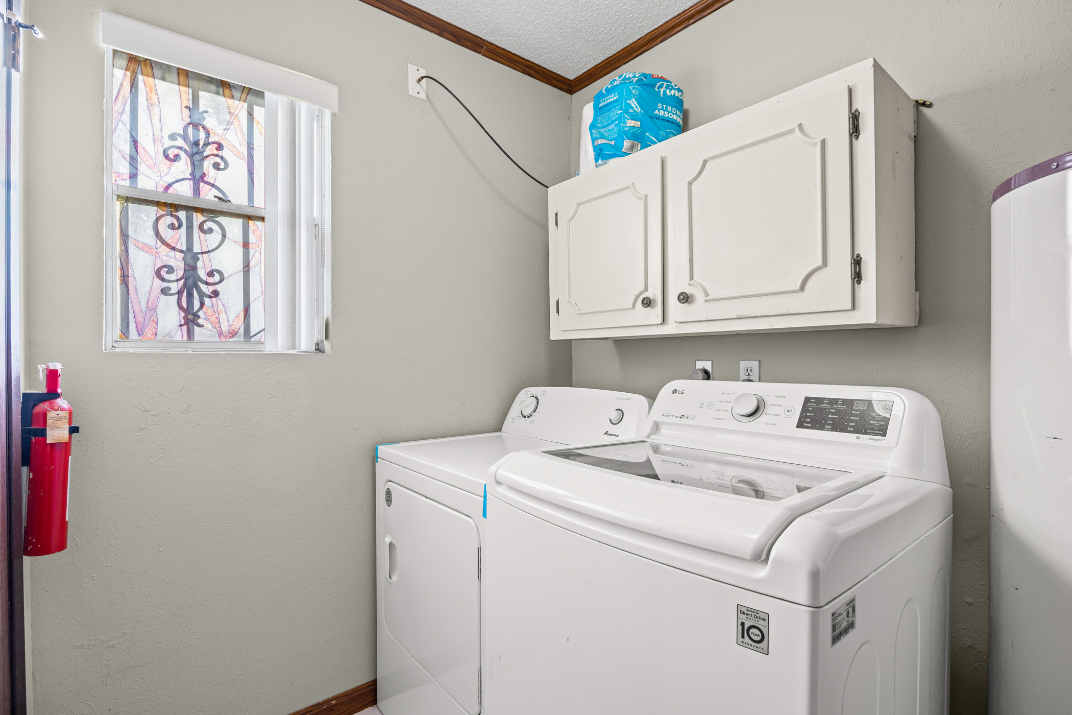 6300 Libyan Drive Austin, TX 78745 - Photo 17 of 35 a utility room with dryer and washer