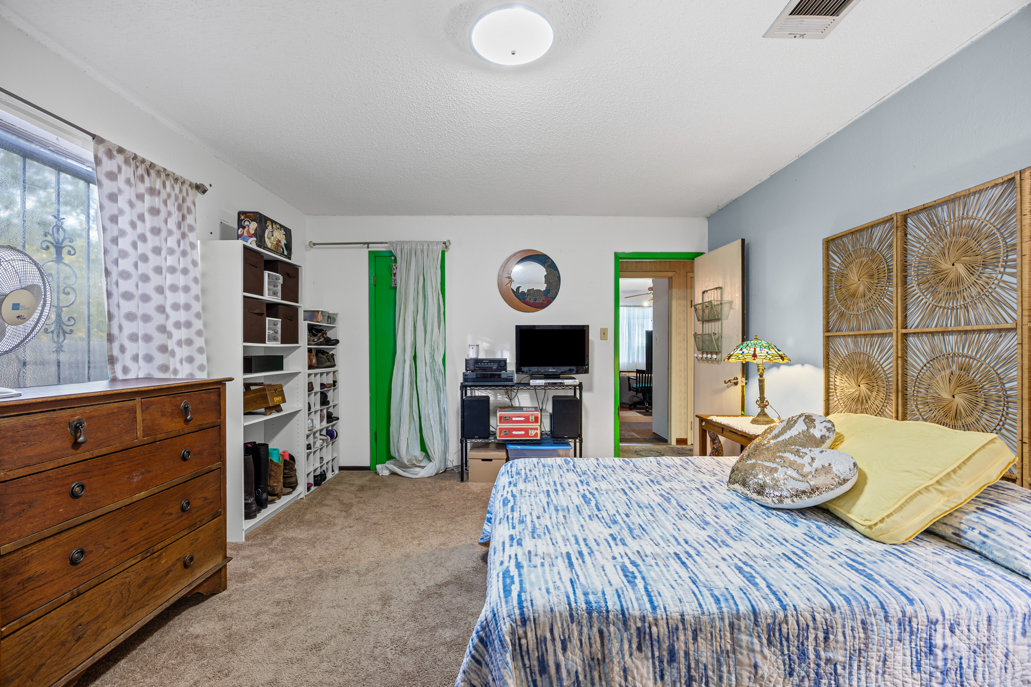 6300 Libyan Drive Austin, TX 78745 - Photo 21 of 35 a bedroom with a bed and furniture