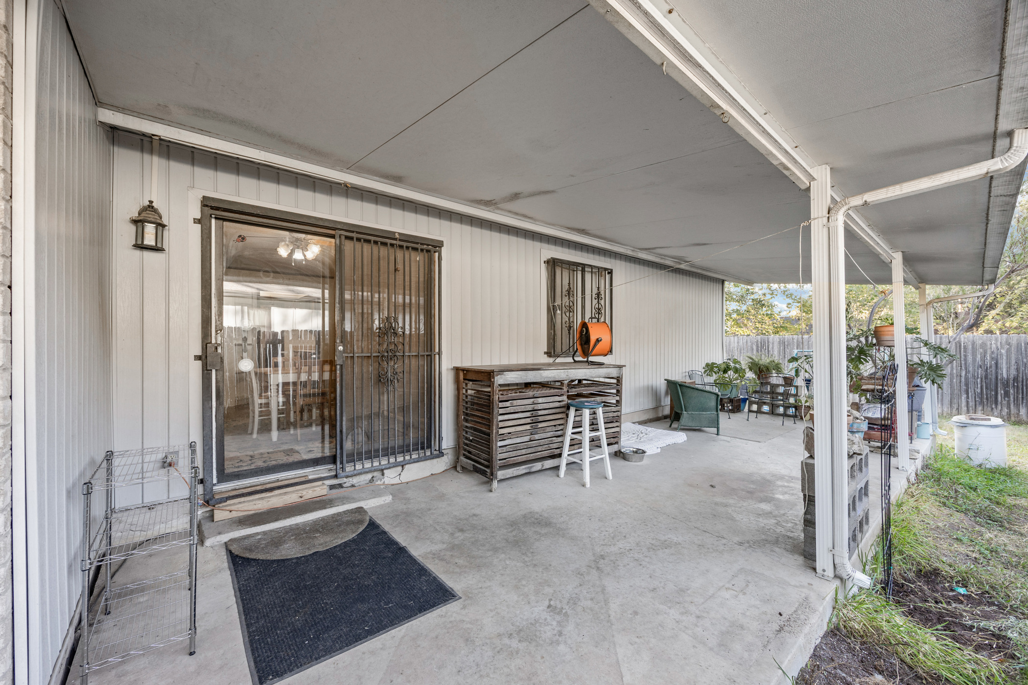 6300 Libyan Drive Austin, TX 78745 - Photo 27 of 35 a view of a porch with chairs and floor to ceiling window