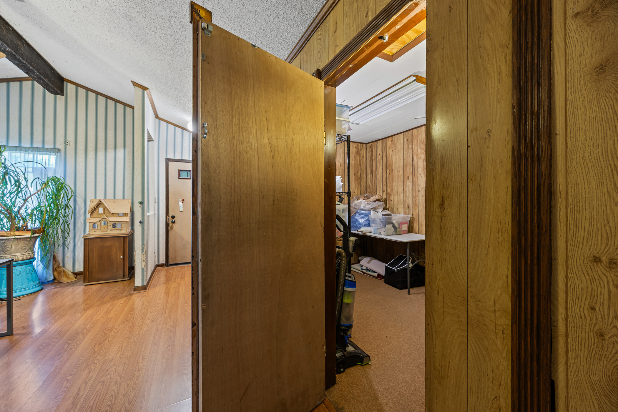 6300 Libyan Drive Austin, TX 78745 - Photo 9 of 35 a view of hallway with livingroom and wooden floor