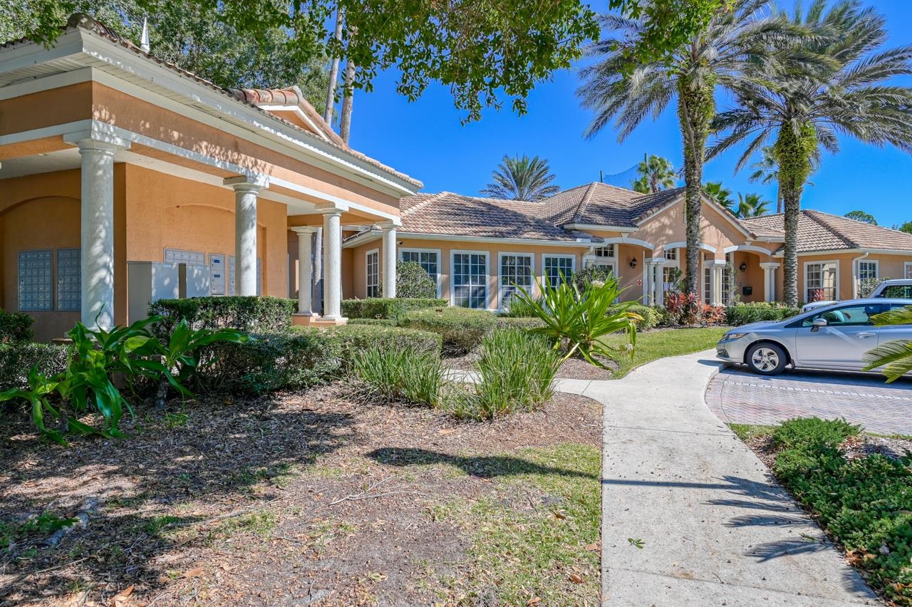 605 Fairway Drive, Unit 305 St. Augustine, FL 32084 - Photo 11 of 23 a front view of a house with garden