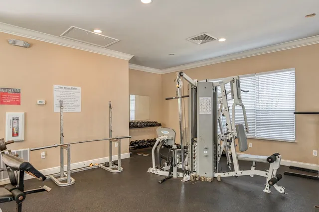 a view of a room with gym equipment