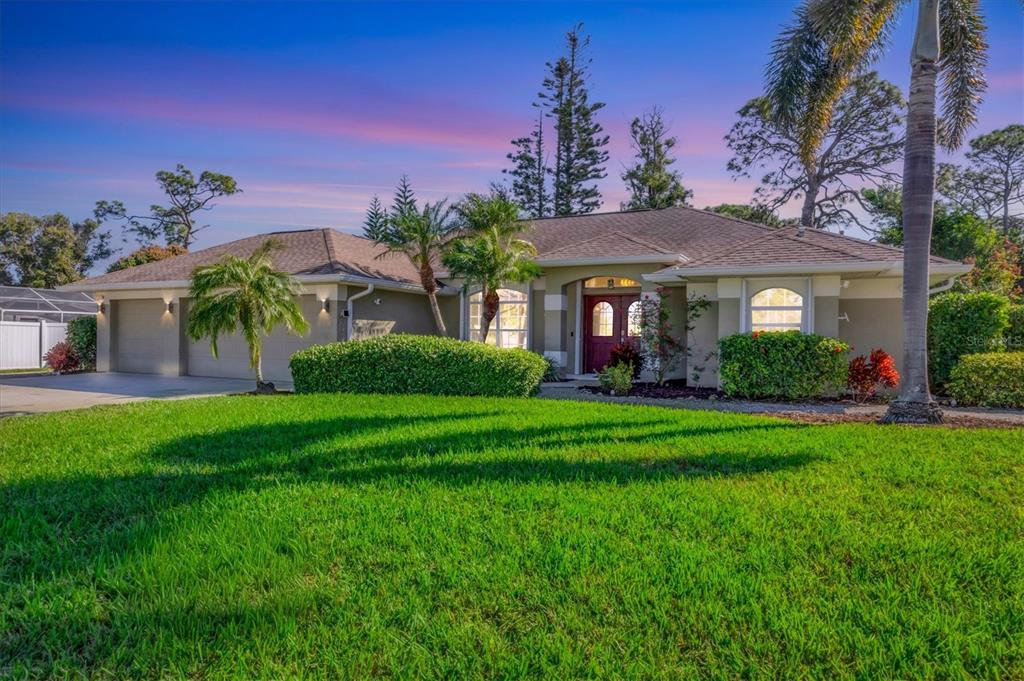 931 Piedmont Road Venice, FL 34293 - Photo 1 of 1 a view of a house with a yard