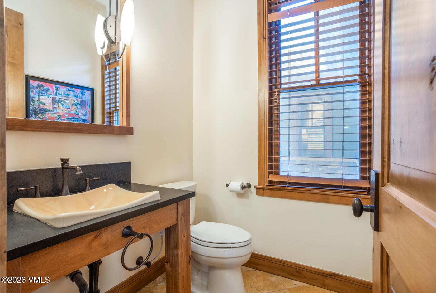 34900 Colorado River Road McCoy, CO 80463 - Photo 33 of 46 a bathroom with a sink a toilet and a mirror
