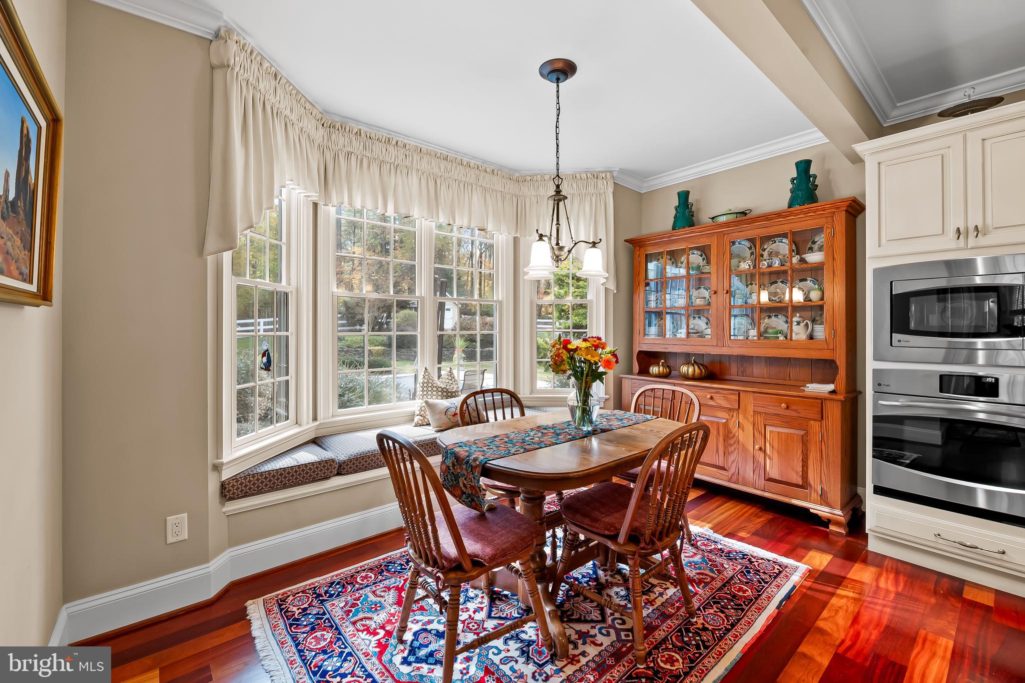 2049 Corbett Road Monkton, MD 21111 - Photo 16 of 66 a view of a dining room with furniture window and wooden floor