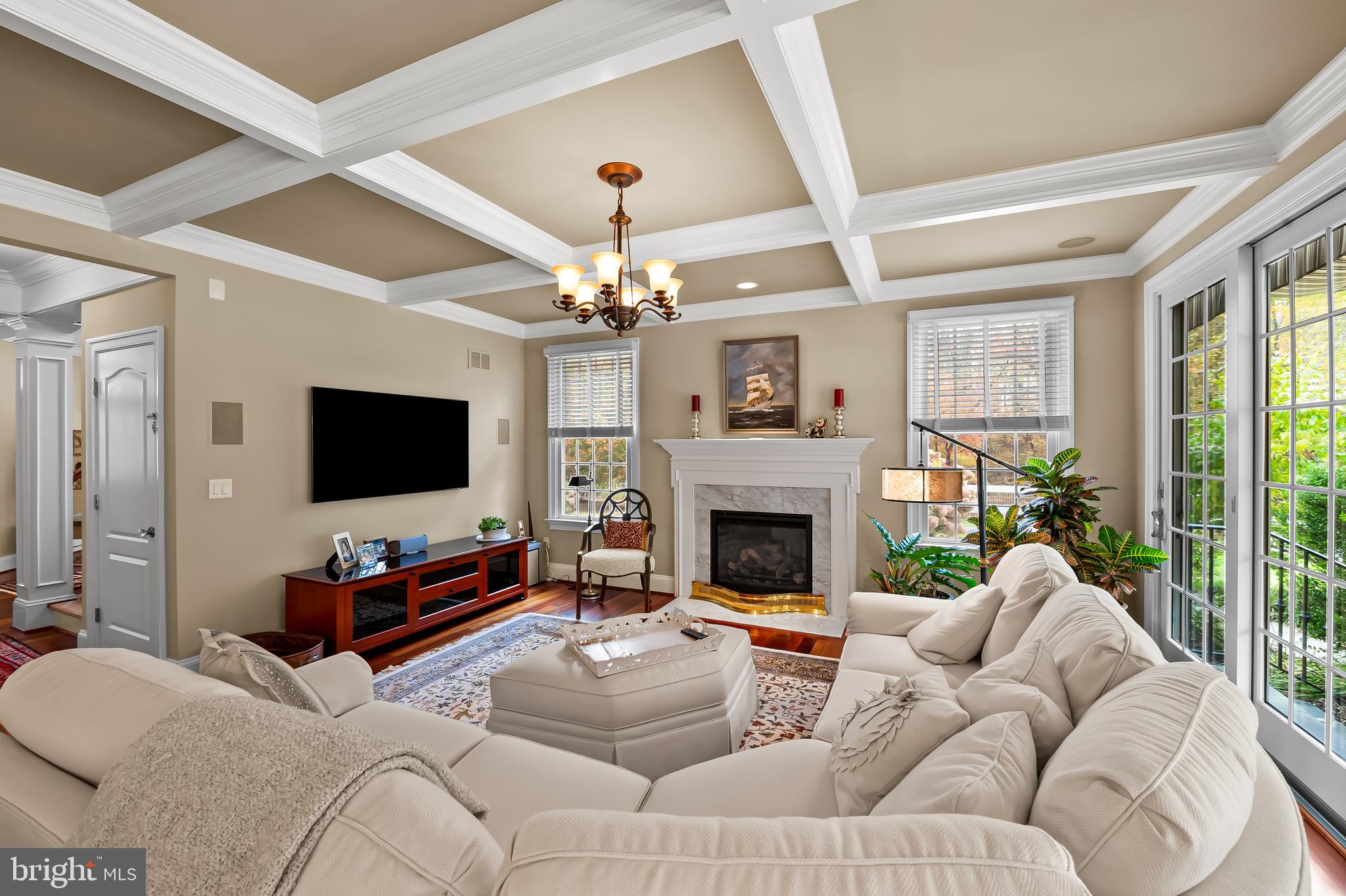 2049 Corbett Road Monkton, MD 21111 - Photo 17 of 66 a living room with furniture a flat screen tv and a fireplace