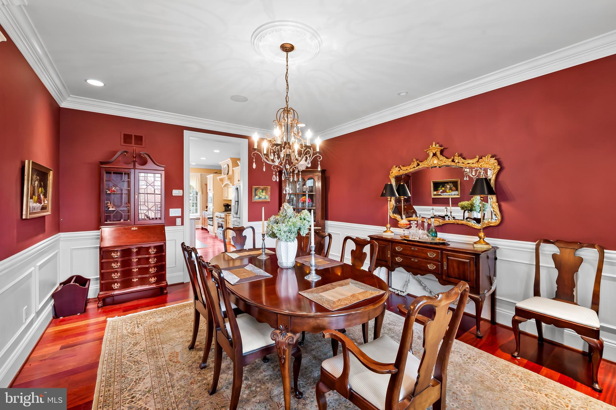 2049 Corbett Road Monkton, MD 21111 - Photo 22 of 66 a view of a dining room with furniture and a chandelier