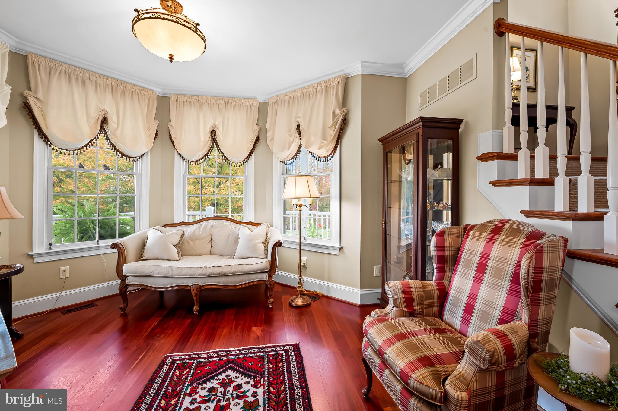 2049 Corbett Road Monkton, MD 21111 - Photo 26 of 66 a living room with furniture fireplace and a large window