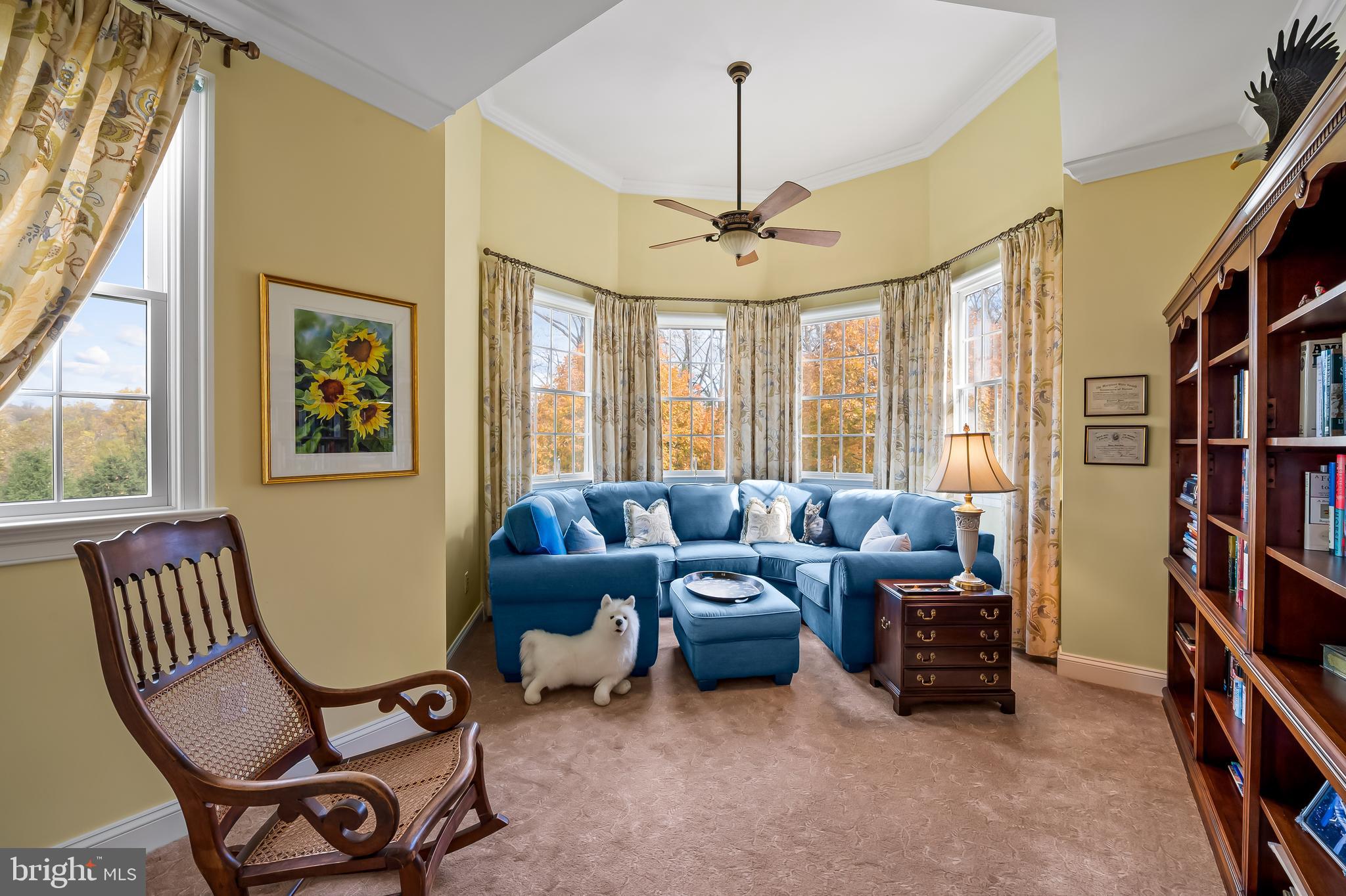 2049 Corbett Road Monkton, MD 21111 - Photo 48 of 66 a living room with furniture a bookshelf and a window