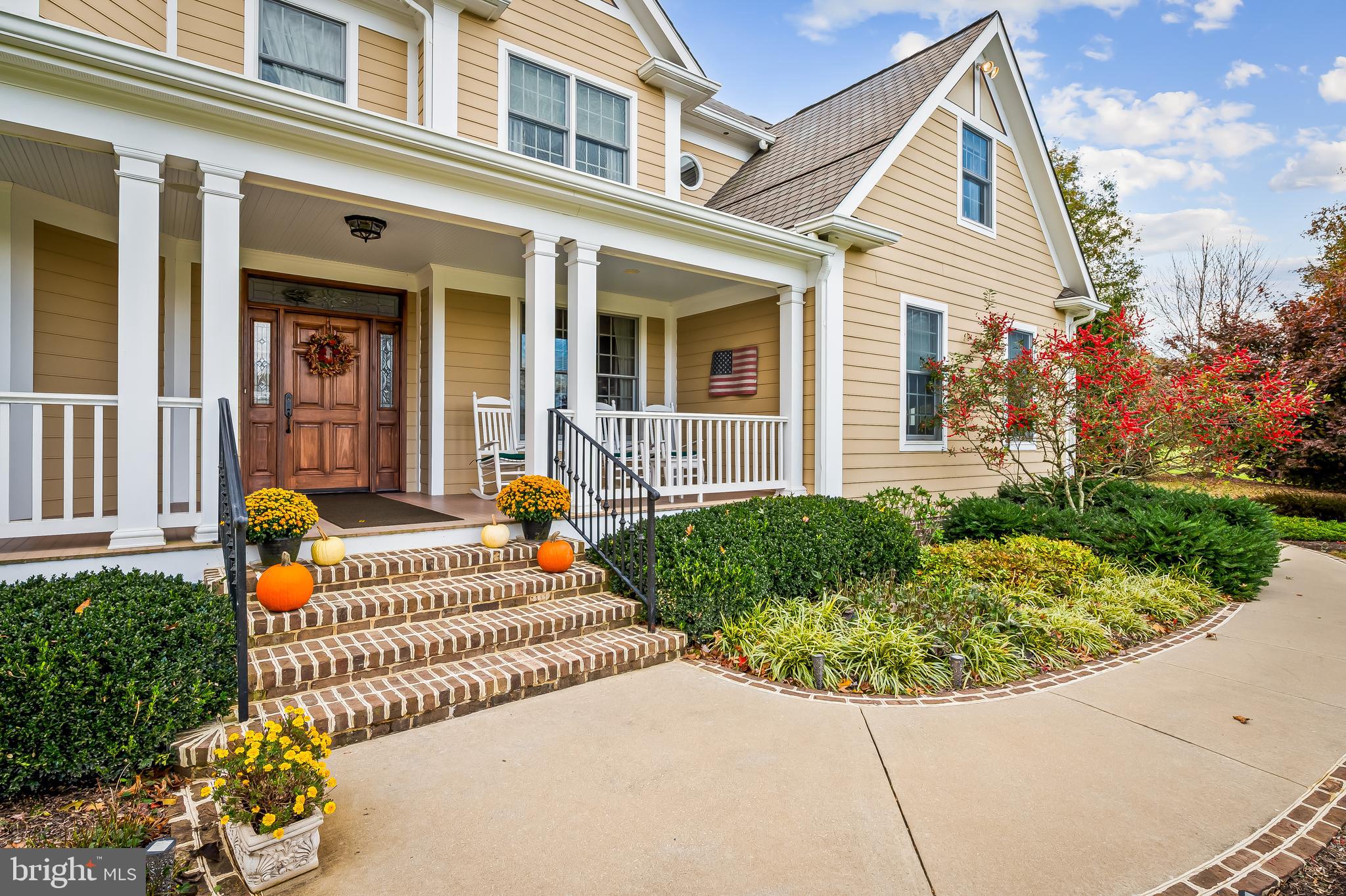 2049 Corbett Road Monkton, MD 21111 - Photo 5 of 66 front view of a house with a bench