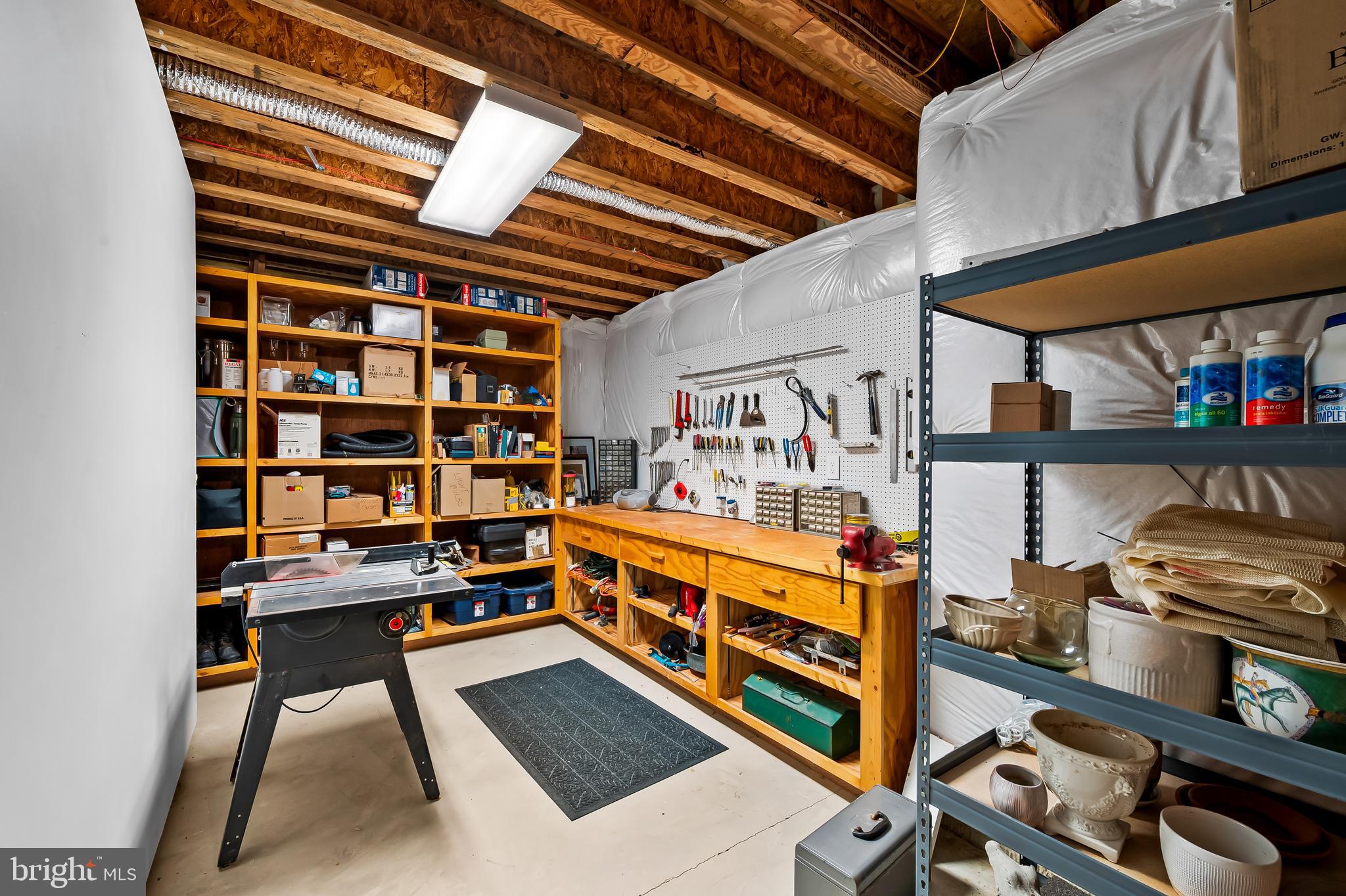 2049 Corbett Road Monkton, MD 21111 - Photo 55 of 66 a view of a room with racks a book shelf