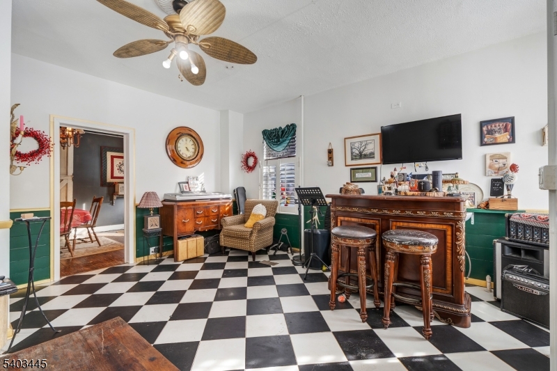 44 Main Street Califon, NJ 07830 - Photo 14 of 42 a living room with furniture and a flat screen tv