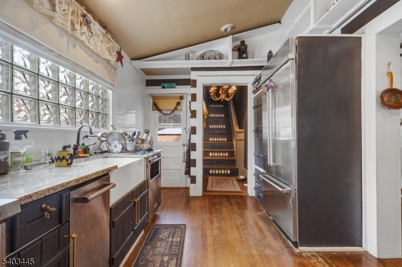 44 Main Street Califon, NJ 07830 - Photo 19 of 42 a kitchen with stainless steel appliances a stove and a refrigerator