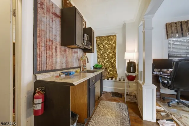 a kitchen with a stove and a refrigerator