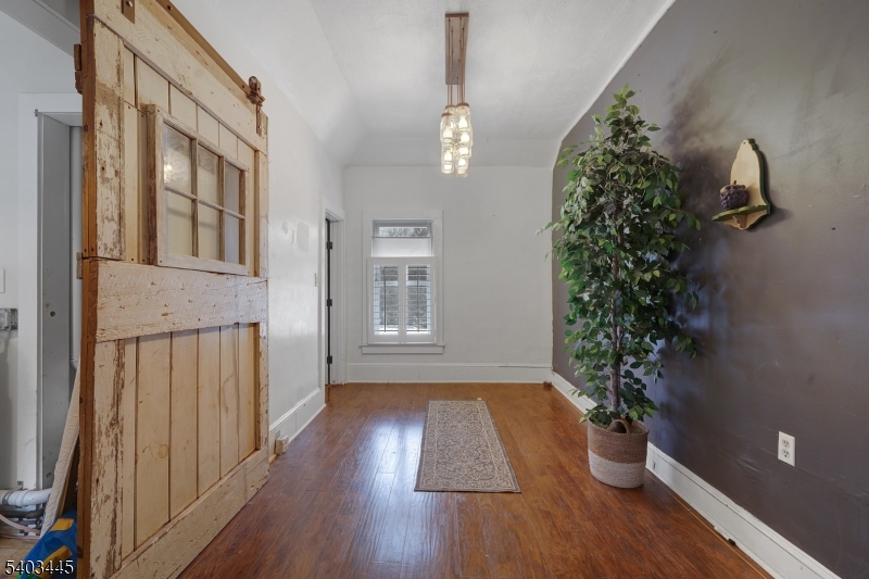 44 Main Street Califon, NJ 07830 - Photo 25 of 42 wooden floor in an empty room with a window