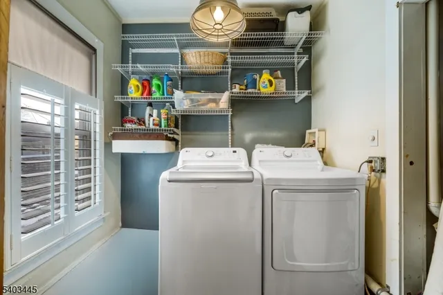 a view of washer and dryer in a utility room