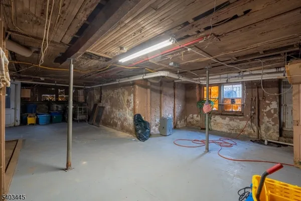 a view of a room with wooden walls