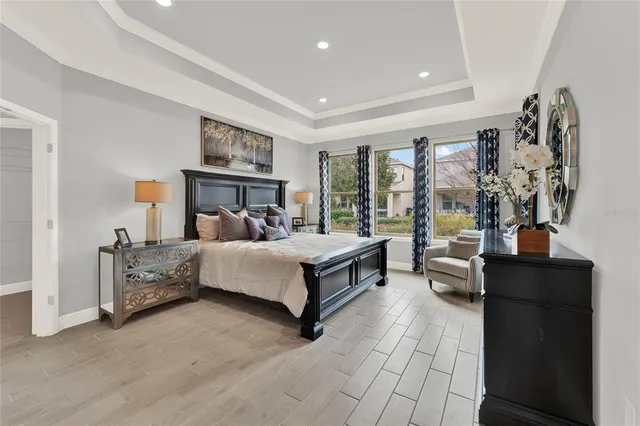 a bed room with furniture and window