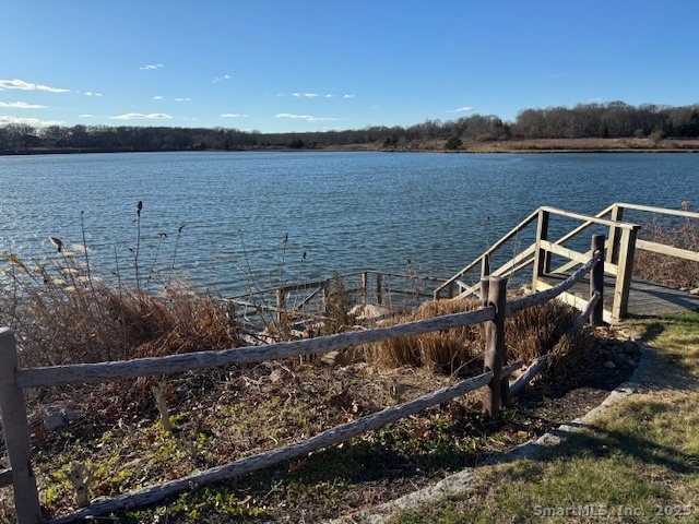 123 Seneca Drive Groton, CT 06340 - Photo 6 of 25 a view of a lake with a mountain