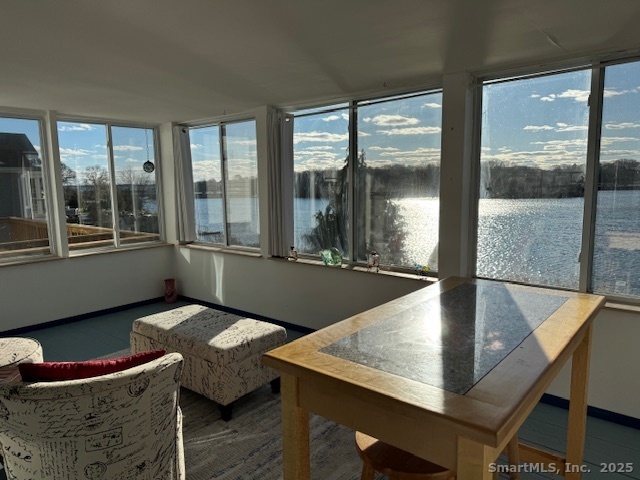 123 Seneca Drive Groton, CT 06340 - Photo 8 of 25 a view of a living room and dining room