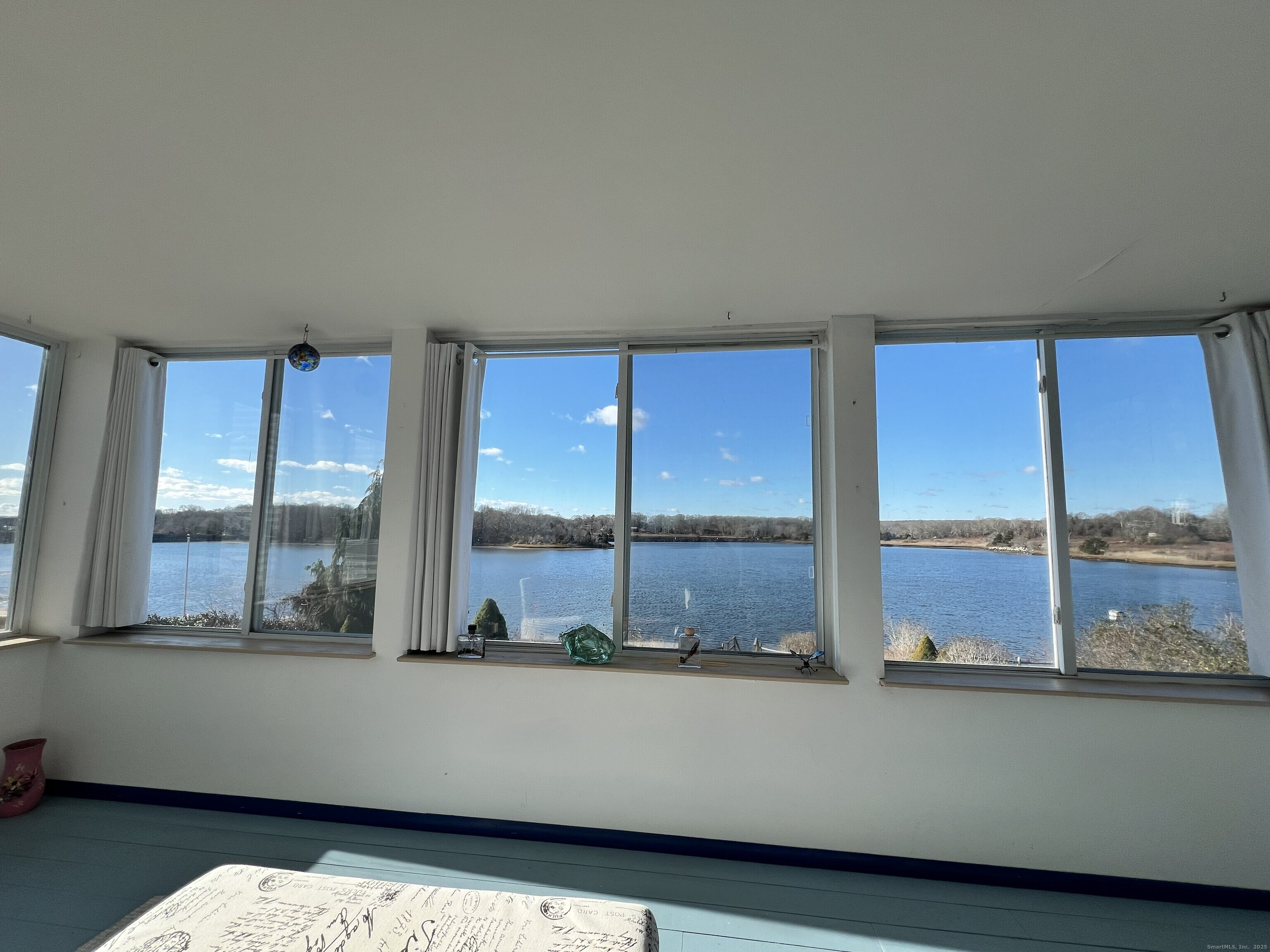 123 Seneca Drive Groton, CT 06340 - Photo 9 of 25 a living room with a large window