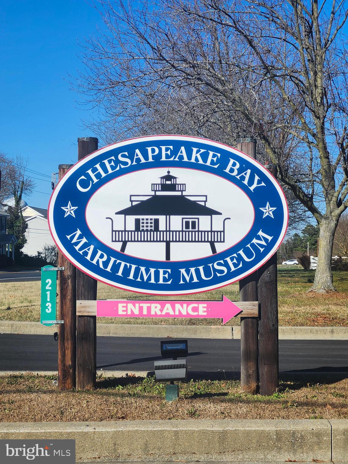 16 Meadow Street St. Michaels, MD 21663 - Photo 12 of 25 a sign on the side of a building