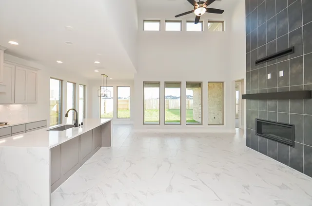 a large living room with a large window