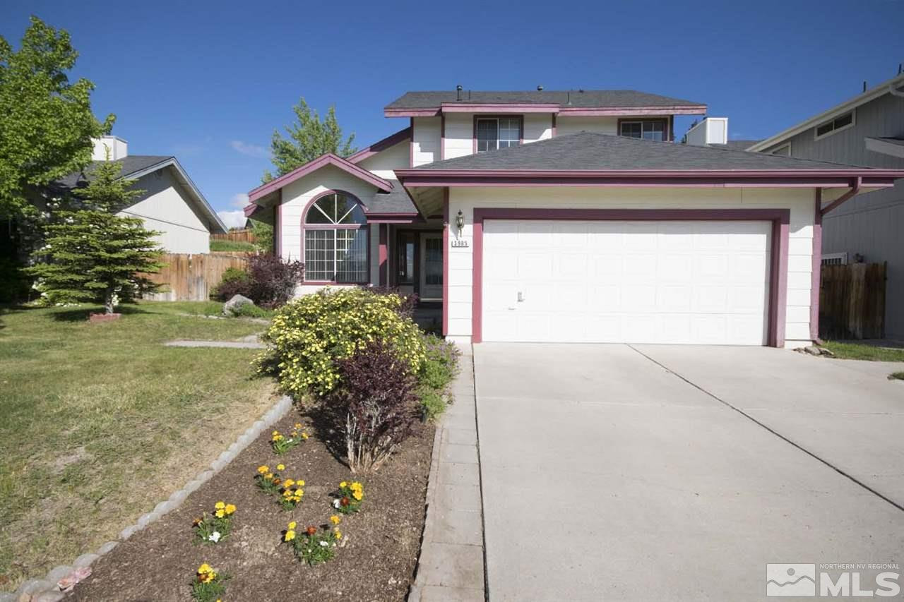 3985 Regal Drive Reno, NV 89503 - Photo 1 of 1 a front view of a house with a yard